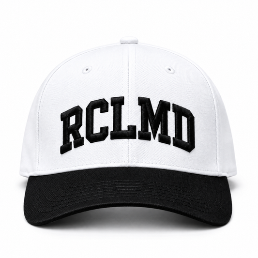 RCLMD snapback in white with black brim and black collegiate RCLMD embroidery