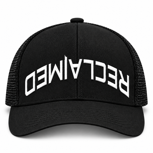 RCLMD black mesh trucker snapback, front with curved Reclaimed lettering