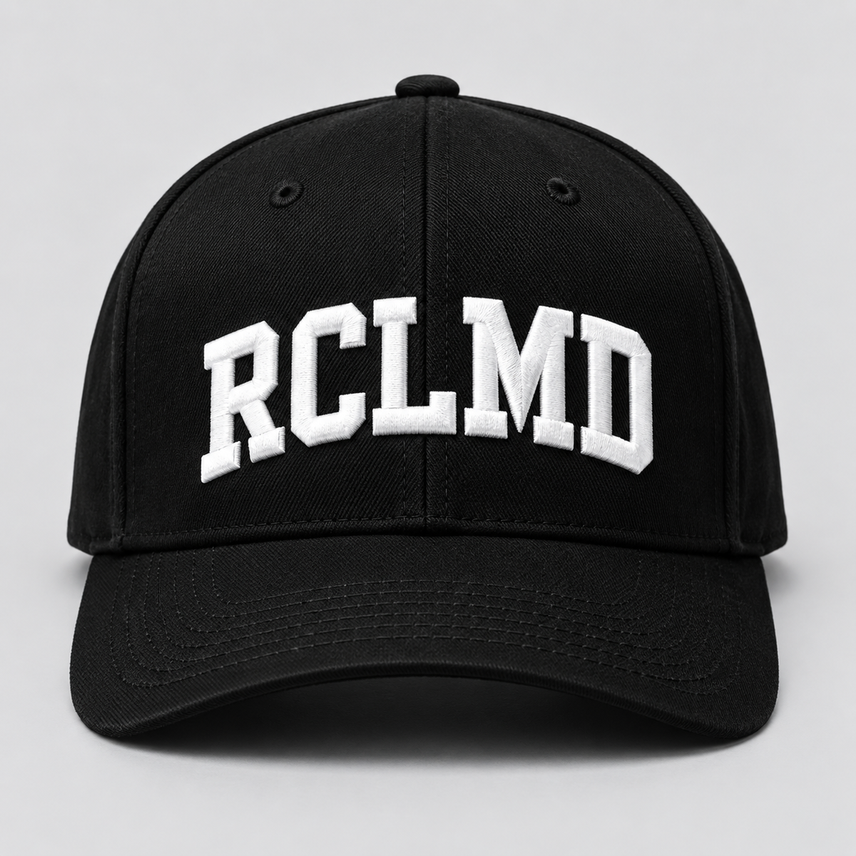 RCLMD snapback in all black with white collegiate RCLMD embroidery